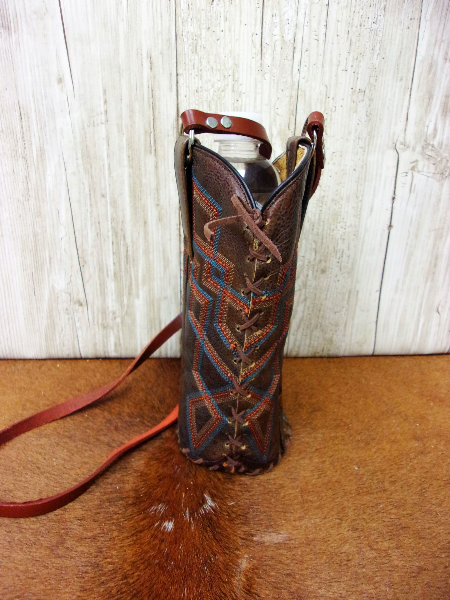 Cowboy Boot Wine Water Tote WA38 handcrafted from cowboy boots. Shop Wine Carrier Bags at ChrisThompsonBags.com and buy the best cowgirl wine tote, leather wine carrier, Leather Wine tote, recycled cowboy boots, unique gift for her, unique gift for him, water bottle caddy, water bottle holder, water bottle tote, western wine carrier, western wine tote, wine lovers gift, Wine Tote at Chris Thompson Bags.